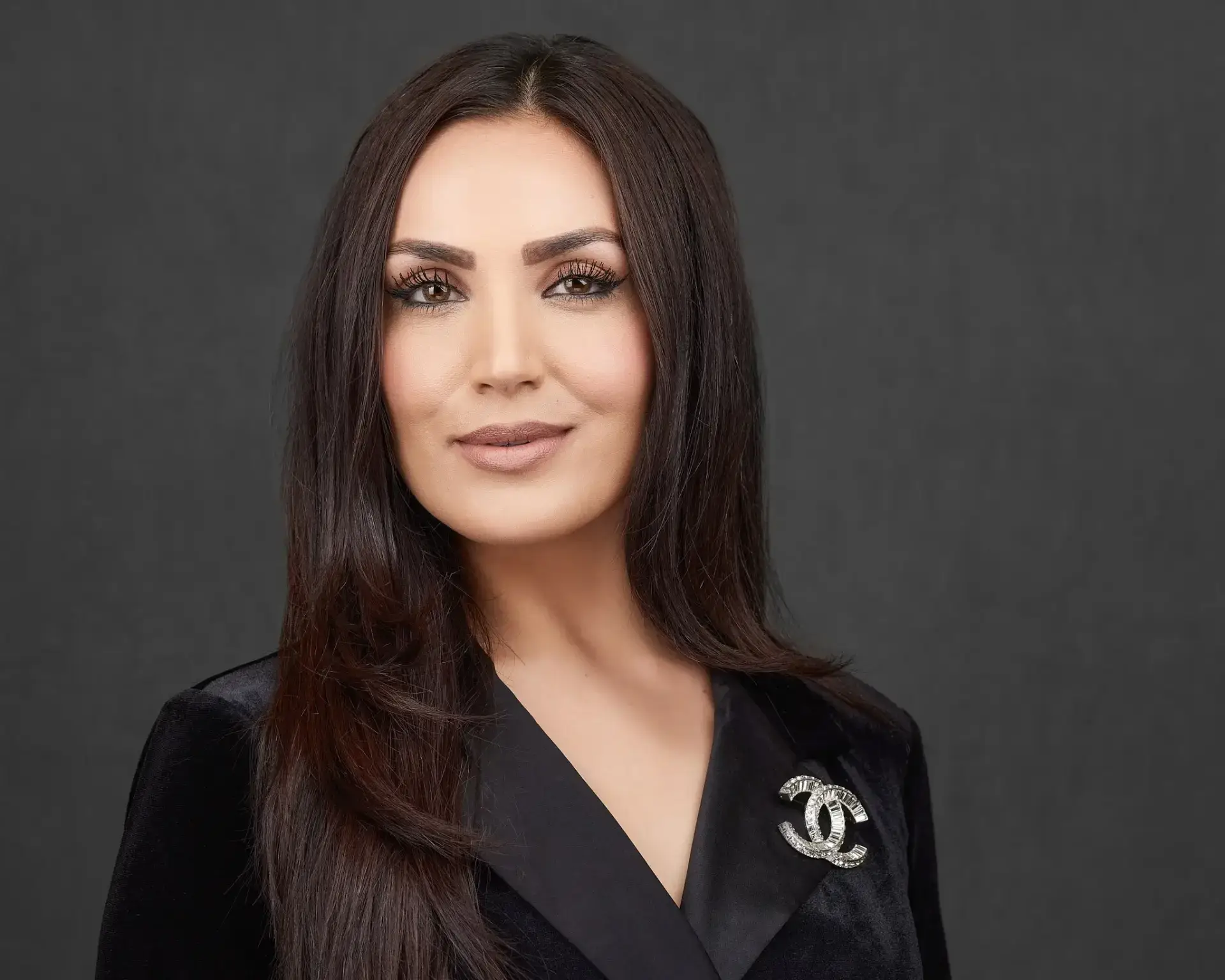 Woman Lawyer Headshot with a chanel pin